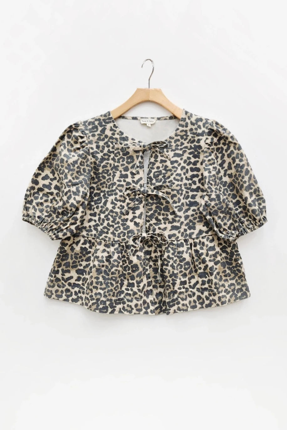 Front Bow-Tie Peplum Blouse- Animal Print